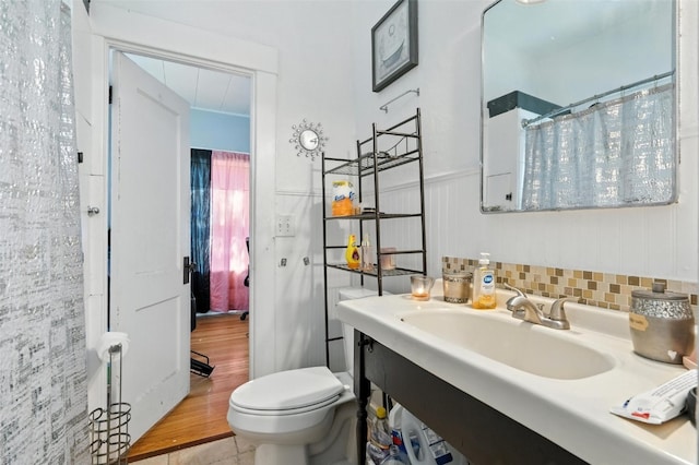 420 16th St NE, Cedar Rapids, IA 52402 - bathroom with vanity and toilet