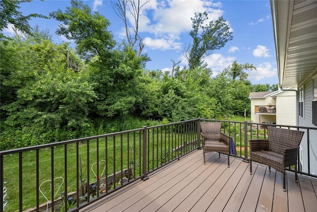 3921 Lexington Dr NE Unit C, Cedar Rapids, IA 52402 - wooden terrace with a lawn