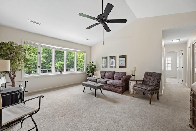3921 Lexington Dr NE Unit C, Cedar Rapids, IA 52402 - carpeted living room with lofted ceiling and a ceiling fan