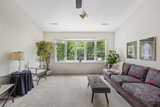 3921 Lexington Dr NE Unit C, Cedar Rapids, IA 52402 - carpeted living area featuring baseboards