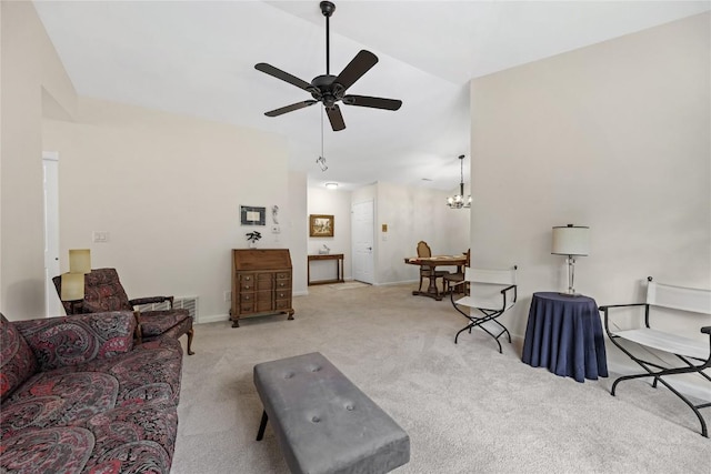 3921 Lexington Dr NE Unit C, Cedar Rapids, IA 52402 - carpeted living room featuring ceiling fan and a chandelier
