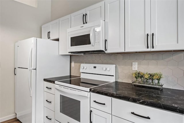 3921 Lexington Dr NE Unit C, Cedar Rapids, IA 52402 - kitchen featuring white appliances and white cabinetry