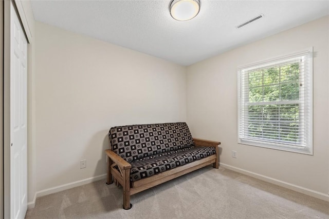 3921 Lexington Dr NE Unit C, Cedar Rapids, IA 52402 - sitting room featuring carpet