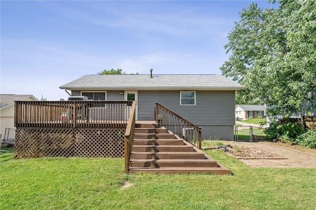 5929 Underwood Ave SW, Cedar Rapids, IA 52404 - rear view of house with a wooden deck, stairway, and roof with shingles