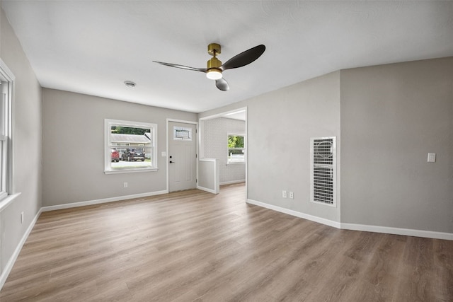 6404 Parkview Ave, Cedar Rapids, IA 52403 - spare room with ceiling fan, light wood-type flooring, and a heating unit