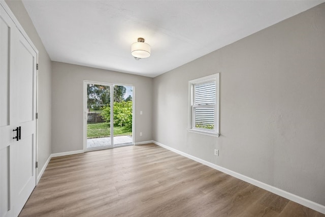 6404 Parkview Ave, Cedar Rapids, IA 52403 - empty room featuring light wood-type flooring and baseboards