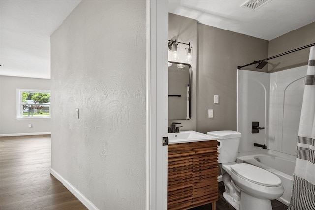 6404 Parkview Ave, Cedar Rapids, IA 52403 - full bathroom with vanity, shower / bath combo with shower curtain, and wood finished floors