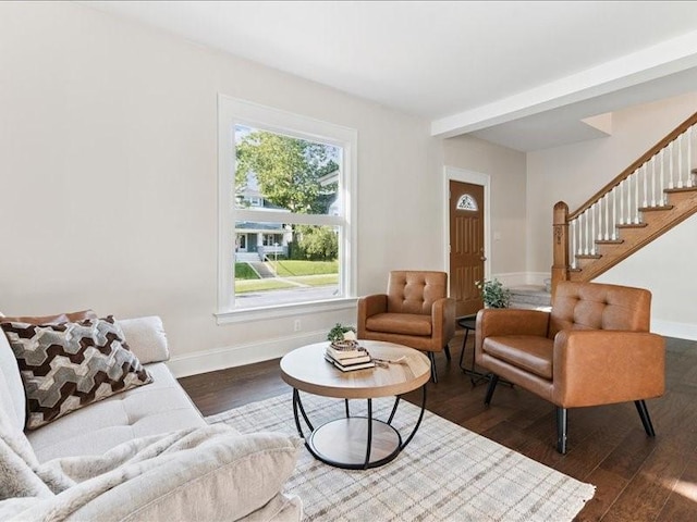 1308 A Ave NW, Cedar Rapids, IA 52405 - living room with dark wood-type flooring, stairs, and beamed ceiling