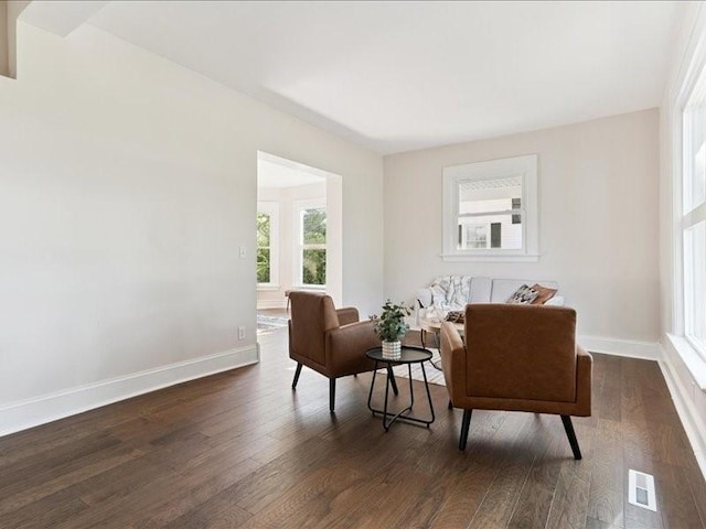 1308 A Ave NW, Cedar Rapids, IA 52405 - living area with dark wood finished floors and baseboards