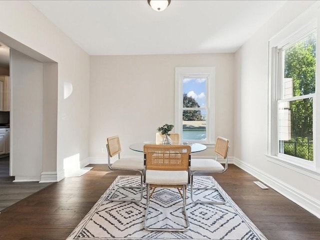 1308 A Ave NW, Cedar Rapids, IA 52405 - dining area with healthy amount of natural light and dark wood-type flooring