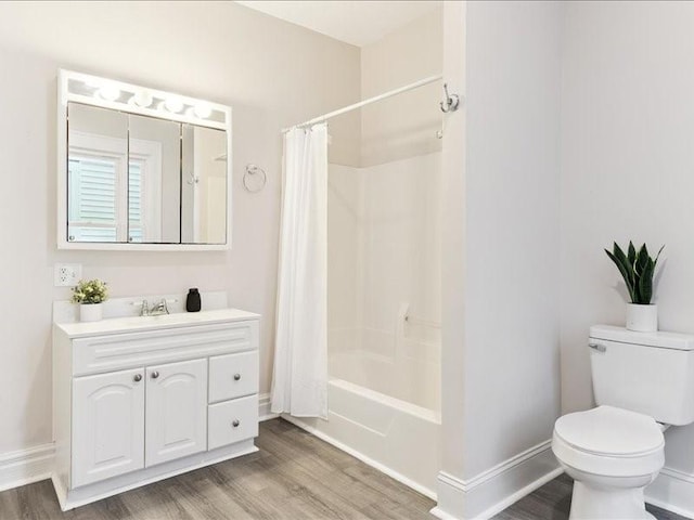 1308 A Ave NW, Cedar Rapids, IA 52405 - bathroom featuring vanity, wood finished floors, and shower / tub combo