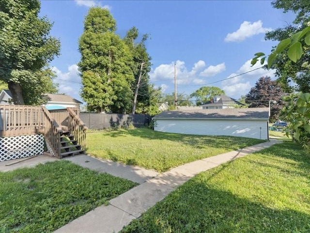 1308 A Ave NW, Cedar Rapids, IA 52405 - view of yard featuring a wooden deck and stairs