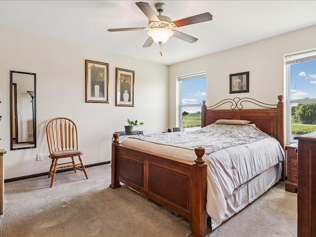 550 Meadow Oak Cir, Fairfax, IA 52228 - bedroom featuring light carpet and ceiling fan
