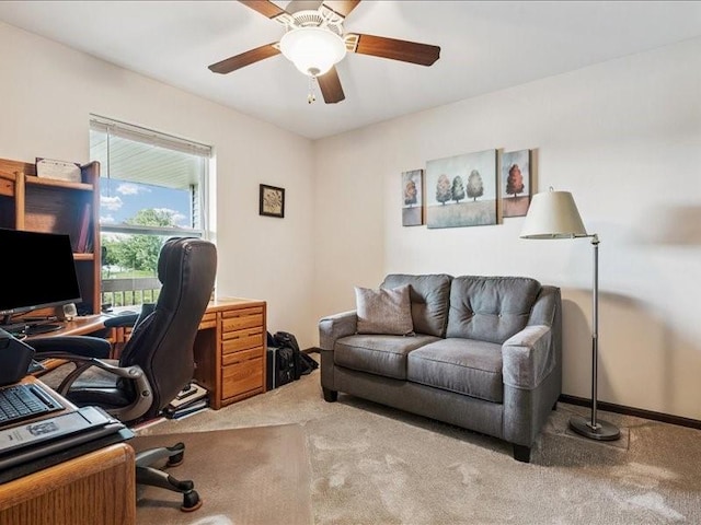 550 Meadow Oak Cir, Fairfax, IA 52228 - carpeted home office featuring a ceiling fan and baseboards