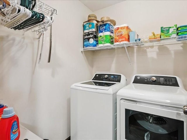 550 Meadow Oak Cir, Fairfax, IA 52228 - washroom featuring separate washer and dryer