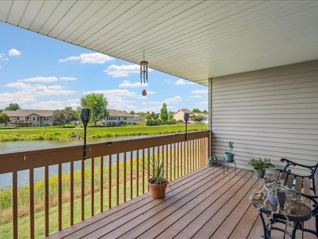550 Meadow Oak Cir, Fairfax, IA 52228 - deck with a water view and a residential view