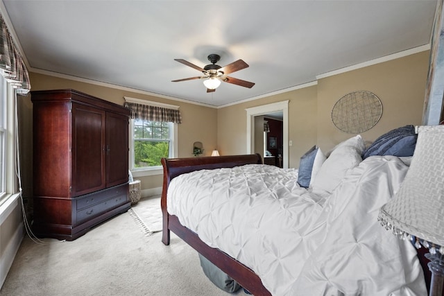 2144 Grande Ave SE, Cedar Rapids, IA 52403 - bedroom with light carpet, ceiling fan, and ornamental molding