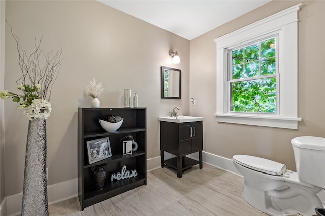 2144 Grande Ave SE, Cedar Rapids, IA 52403 - bathroom featuring toilet and vanity