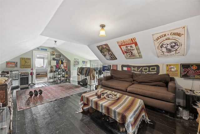 2144 Grande Ave SE, Cedar Rapids, IA 52403 - living area featuring wood-type flooring and vaulted ceiling