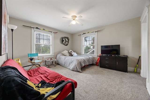 2144 Grande Ave SE, Cedar Rapids, IA 52403 - bedroom with carpet floors and a ceiling fan