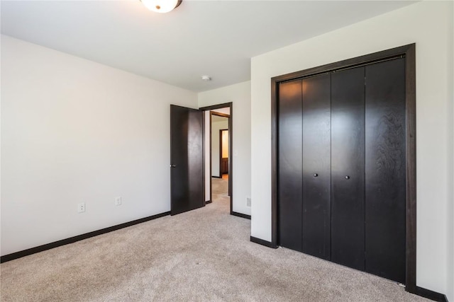 914 Deer Run Dr NE, Cedar Rapids, IA 52402 - unfurnished bedroom with light colored carpet and a closet