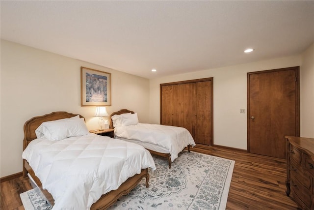 1579 Matterhorn Dr NE, Cedar Rapids, IA 52402 - bedroom with dark wood-style flooring, a closet, and recessed lighting