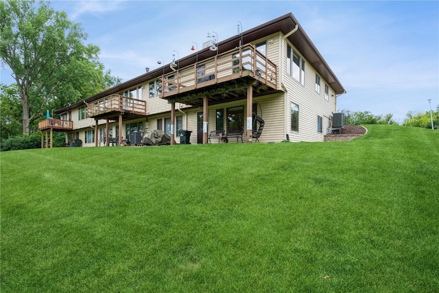 1579 Matterhorn Dr NE, Cedar Rapids, IA 52402 - rear view of house featuring a yard and a wooden deck