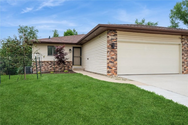 1579 Matterhorn Dr NE, Cedar Rapids, IA 52402 - ranch-style house featuring brick siding, driveway, and a garage