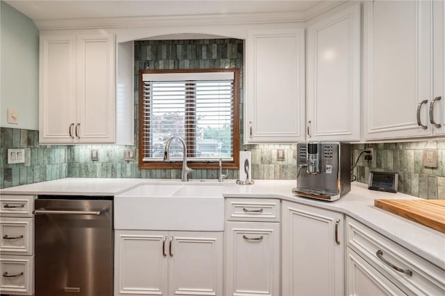 1579 Matterhorn Dr NE, Cedar Rapids, IA 52402 - kitchen with dishwasher, light countertops, white cabinets, and decorative backsplash