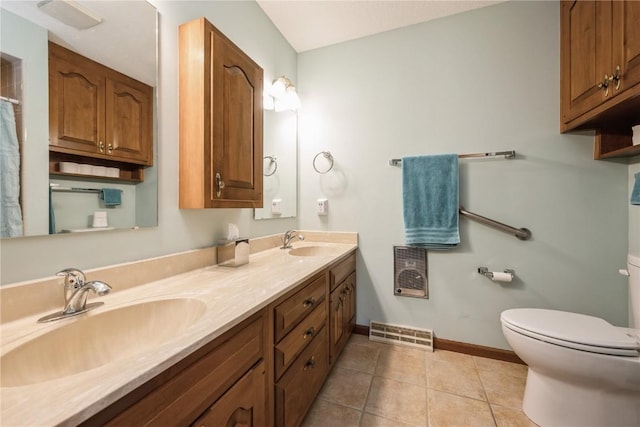 1579 Matterhorn Dr NE, Cedar Rapids, IA 52402 - full bathroom featuring double vanity and tile patterned floors