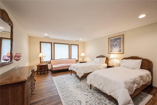 1579 Matterhorn Dr NE, Cedar Rapids, IA 52402 - bedroom with dark wood-style floors and recessed lighting