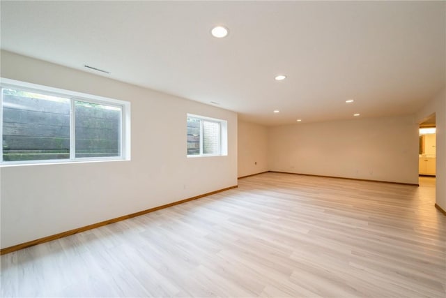 2500 Creekside Dr, Hiawatha, IA 52233 - spare room featuring light wood-style floors and recessed lighting