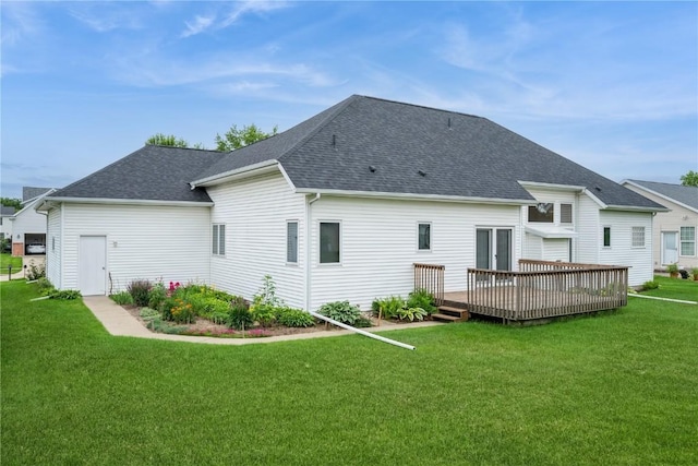 2500 Creekside Dr, Hiawatha, IA 52233 - rear view of house featuring a lawn, a wooden deck, and roof with shingles