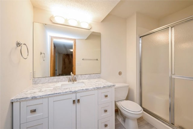 2500 Creekside Dr, Hiawatha, IA 52233 - bathroom with a shower with shower door and vanity
