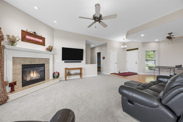 2515 Woodhill Dr SW, Cedar Rapids, IA 52404 - living area featuring a ceiling fan, recessed lighting, carpet flooring, and a tile fireplace