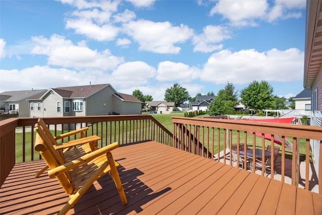 2515 Woodhill Dr SW, Cedar Rapids, IA 52404 - wooden terrace featuring a residential view and a yard