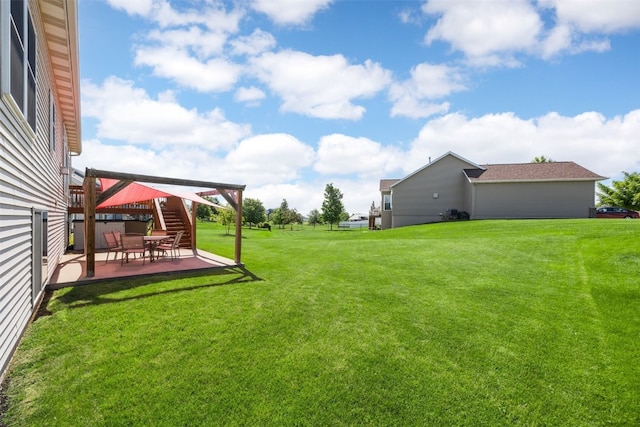 2515 Woodhill Dr SW, Cedar Rapids, IA 52404 - view of green lawn featuring a patio