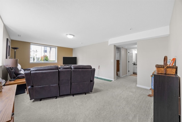 2515 Woodhill Dr SW, Cedar Rapids, IA 52404 - living room featuring light colored carpet and baseboards
