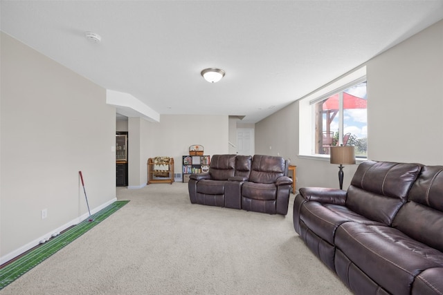 2515 Woodhill Dr SW, Cedar Rapids, IA 52404 - living room featuring light carpet and baseboards