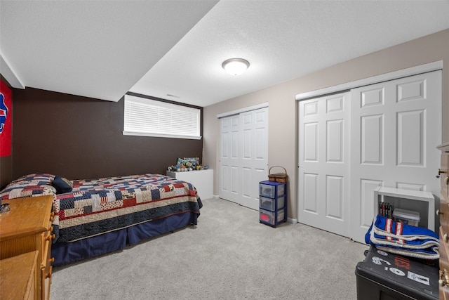 2515 Woodhill Dr SW, Cedar Rapids, IA 52404 - carpeted bedroom with multiple closets