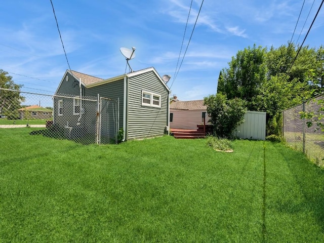 927 O Ave NW, Cedar Rapids, IA 52405 - rear view of property featuring a deck