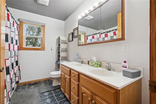 1009 W 1st St, Vinton, IA 52349 - bathroom featuring double vanity, curtained shower, and tile patterned flooring
