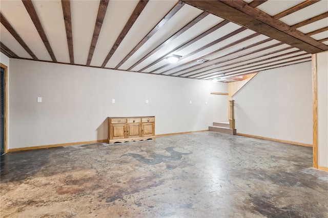 1009 W 1st St, Vinton, IA 52349 - finished basement featuring stairs and baseboards