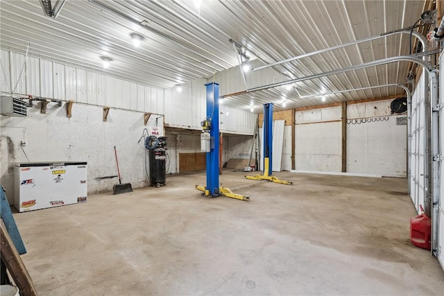 1009 W 1st St, Vinton, IA 52349 - garage featuring white fridge