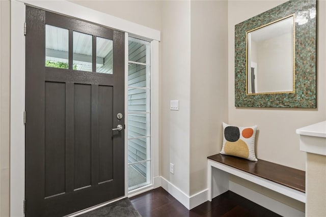 2021 Andrew Charles Dr NW, Cedar Rapids, IA 52405 - entryway with baseboards and dark wood-style flooring