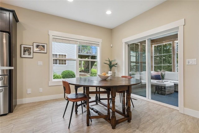 2021 Andrew Charles Dr NW, Cedar Rapids, IA 52405 - dining area featuring baseboards and recessed lighting