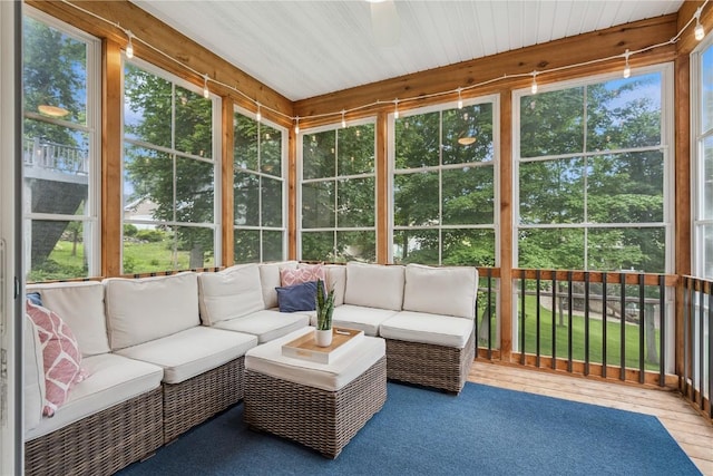 2021 Andrew Charles Dr NW, Cedar Rapids, IA 52405 - sunroom with outdoor lounge area and ceiling fan