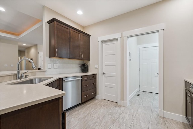 2021 Andrew Charles Dr NW, Cedar Rapids, IA 52405 - kitchen featuring dishwasher, dark brown cabinetry, light countertops, and recessed lighting
