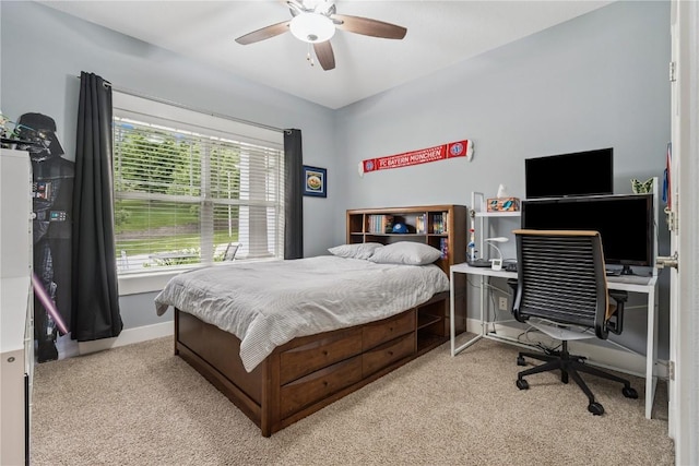 2021 Andrew Charles Dr NW, Cedar Rapids, IA 52405 - bedroom featuring carpet, ceiling fan, and a desk