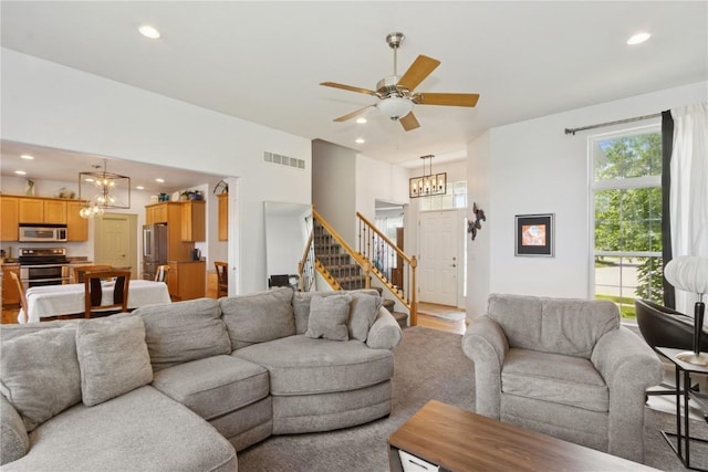 4420 Spring Meadow Pl NE, Cedar Rapids, IA 52411 - living area featuring a chandelier, recessed lighting, stairs, and ceiling fan